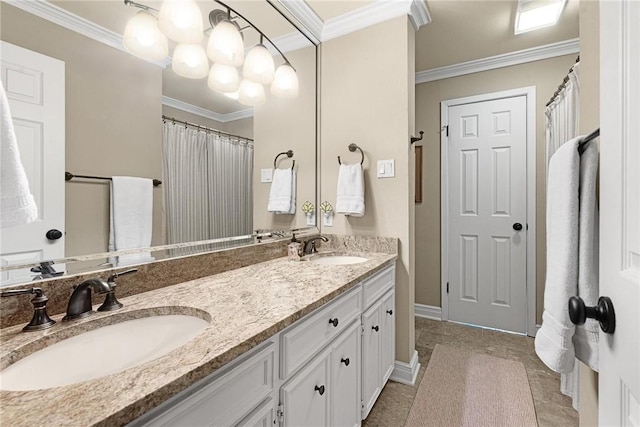 bathroom with baseboards, double vanity, a sink, and crown molding