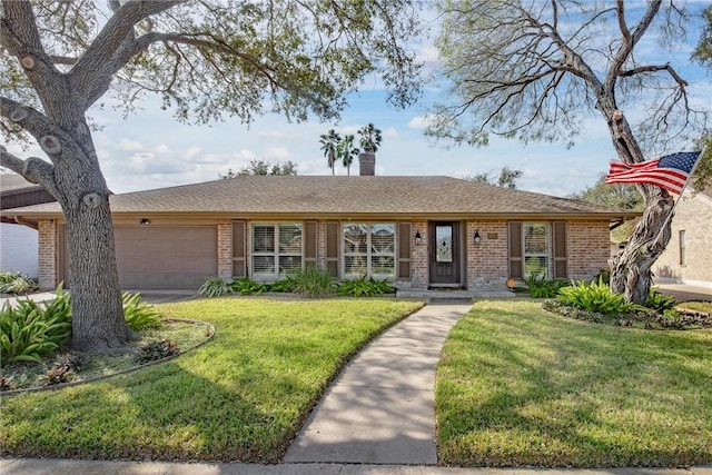 ranch-style home featuring brick siding, roof with shingles, a chimney, a garage, and a front lawn