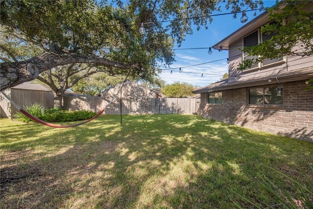 view of yard featuring a fenced backyard