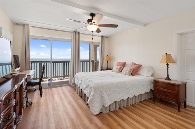 bedroom with beam ceiling, access to outside, a ceiling fan, and light wood finished floors