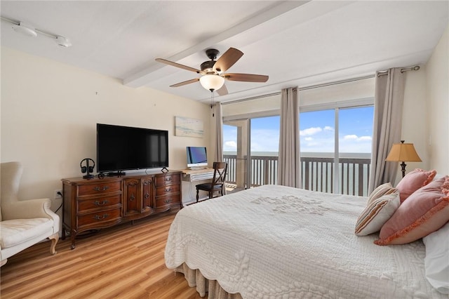 bedroom with access to exterior, beamed ceiling, a ceiling fan, and light wood finished floors