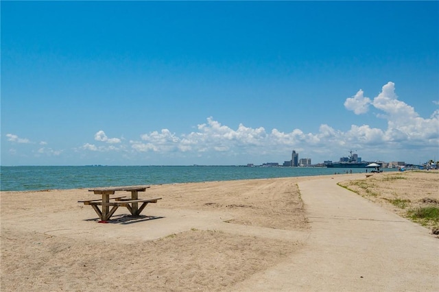 property view of water featuring a beach view