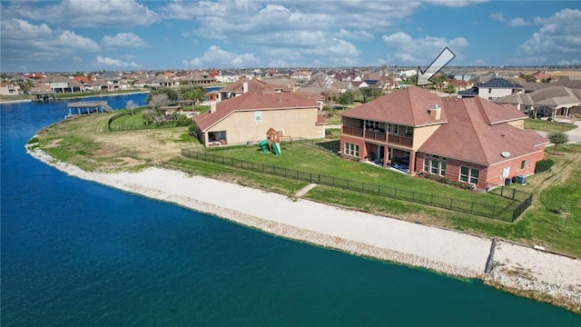 drone / aerial view featuring a water view