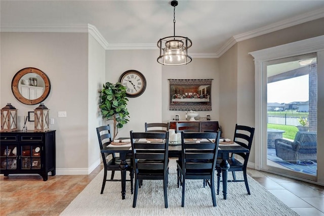 dining space featuring a notable chandelier and ornamental molding