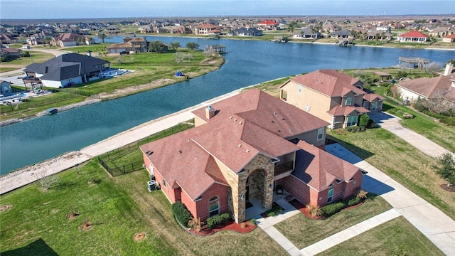 aerial view featuring a water view