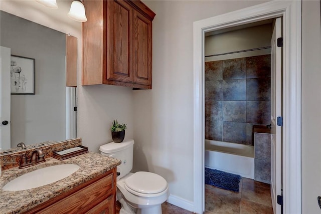 full bathroom with vanity, toilet, and tiled shower / bath combo