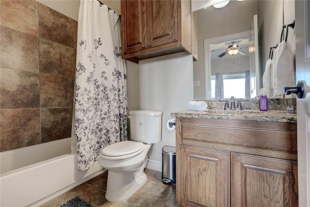 full bathroom featuring vanity, shower / tub combo with curtain, ceiling fan, tile patterned flooring, and toilet