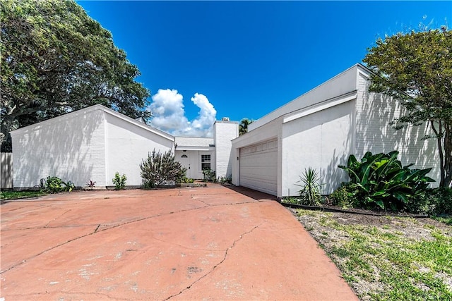 2406 Lakeview Dr, Rockport, TX 78382 - view of side of property with stucco siding