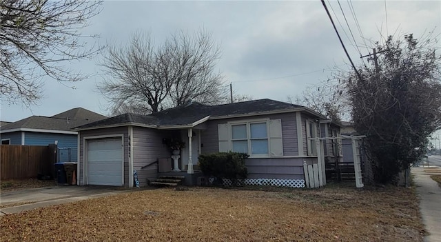 ranch-style house featuring a garage