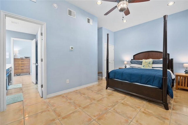 bedroom with visible vents, baseboards, and light tile patterned floors