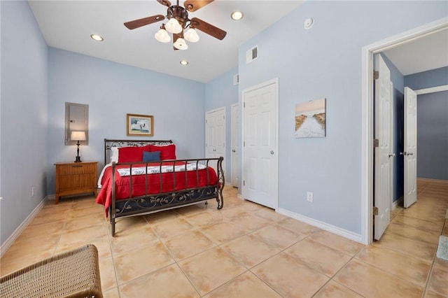 bedroom with visible vents, baseboards, and light tile patterned floors