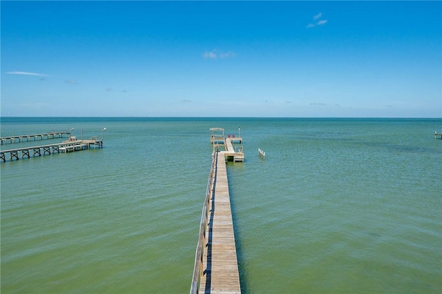 property view of water with a pier