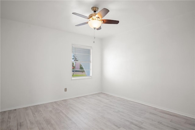 unfurnished room with ceiling fan and light hardwood / wood-style flooring