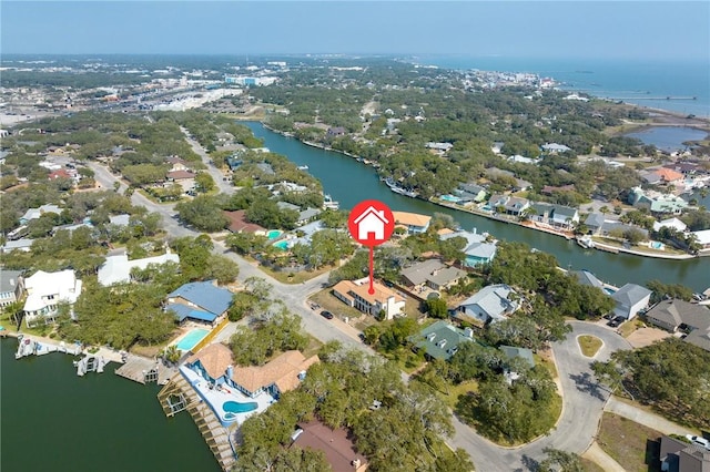 bird's eye view featuring a water view and a residential view
