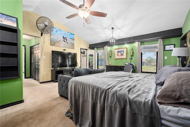 bedroom featuring baseboards, vaulted ceiling, and carpet