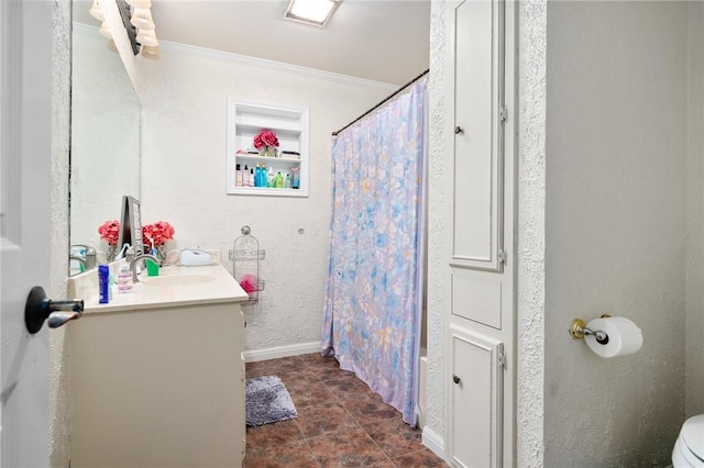 full bathroom with baseboards, ornamental molding, toilet, and vanity