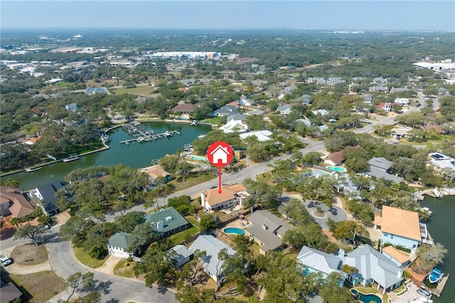 bird's eye view with a water view and a residential view