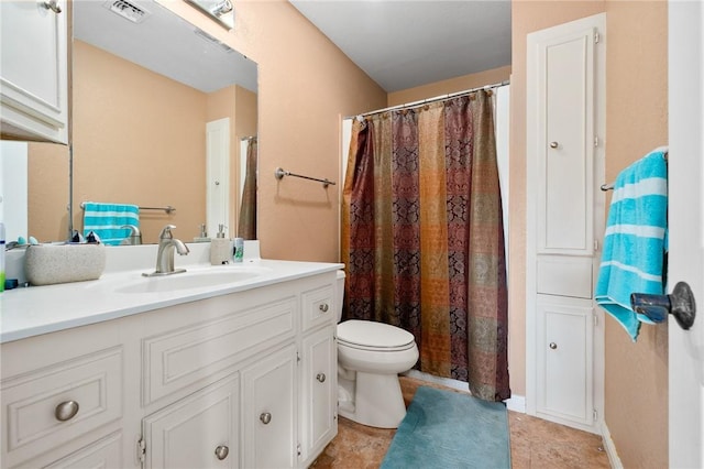 bathroom with toilet, curtained shower, vanity, tile patterned flooring, and visible vents