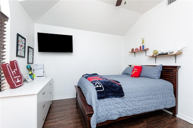 14605 Reagan Dr, Corpus Christi, TX 78410 - bedroom with vaulted ceiling, wood finished floors, baseboards, and a ceiling fan