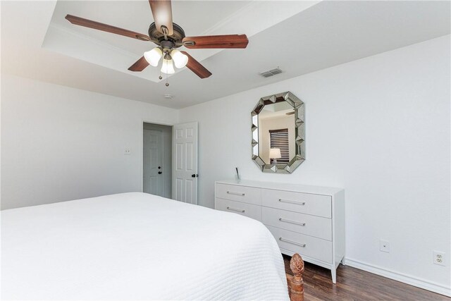 14605 Reagan Dr, Corpus Christi, TX 78410 - bedroom with dark wood-style flooring, baseboards, and a ceiling fan