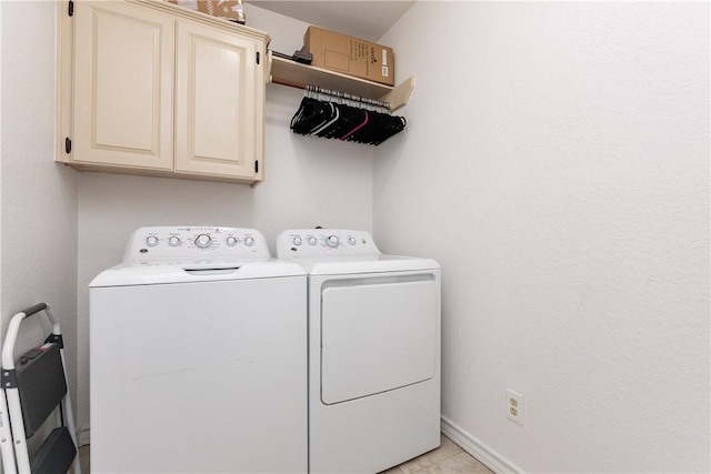 14605 Reagan Dr, Corpus Christi, TX 78410 - laundry room with washing machine and clothes dryer and cabinet space