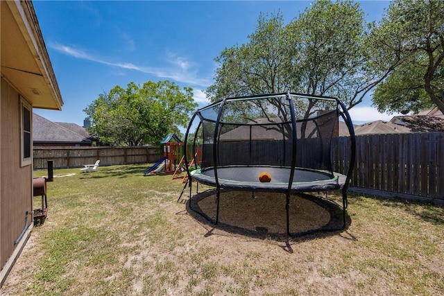 14605 Reagan Dr, Corpus Christi, TX 78410 - view of yard with a trampoline and a playground