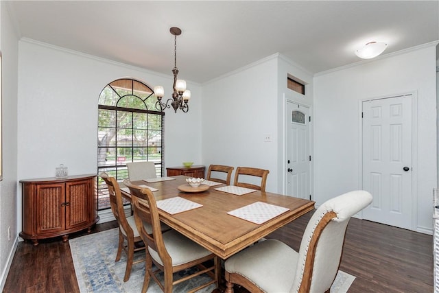 14605 Reagan Dr, Corpus Christi, TX 78410 - dining area featuring wood finished floors, crown molding, a chandelier, and baseboards
