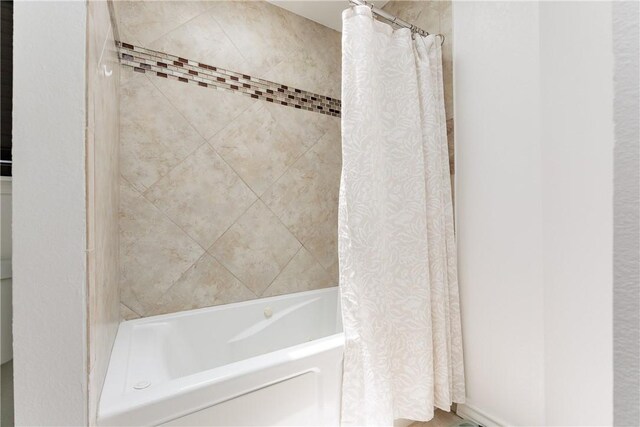 14605 Reagan Dr, Corpus Christi, TX 78410 - bathroom featuring shower / tub combo with curtain