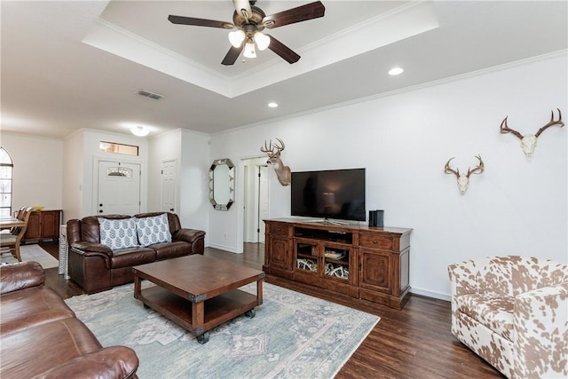 14605 Reagan Dr, Corpus Christi, TX 78410 - living area with a tray ceiling, crown molding, ceiling fan, wood finished floors, and recessed lighting