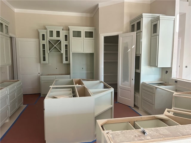 kitchen featuring crown molding