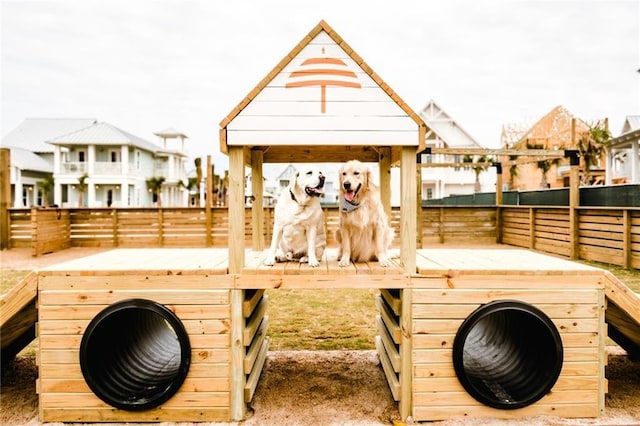 view of jungle gym featuring fence