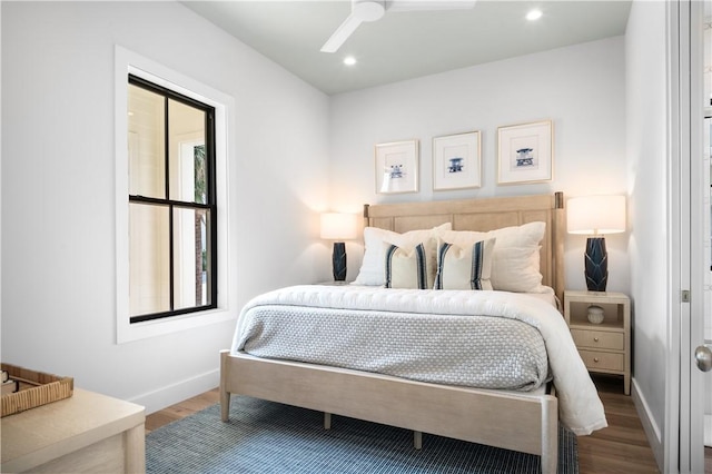 bedroom with a ceiling fan, recessed lighting, baseboards, and wood finished floors