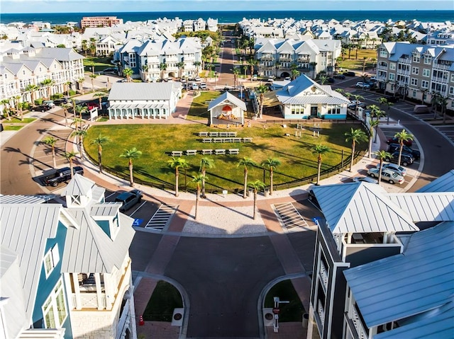 bird's eye view featuring a residential view and a water view