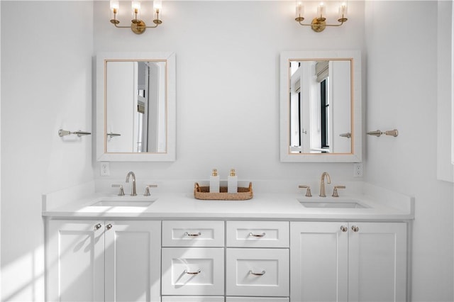 full bath featuring double vanity and a sink