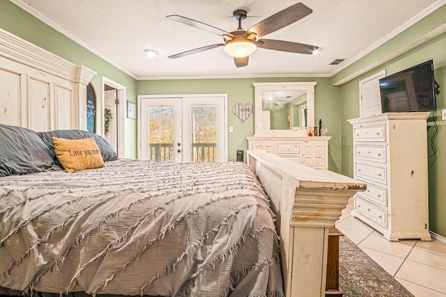 tiled bedroom with ceiling fan, access to exterior, ornamental molding, and french doors