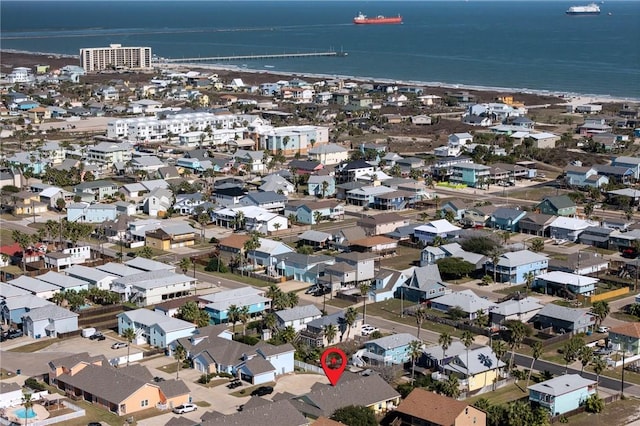 bird's eye view featuring a water view and a residential view