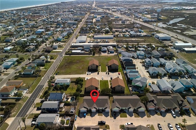 birds eye view of property with a residential view and a water view