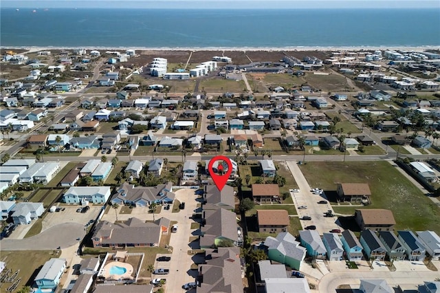 bird's eye view featuring a residential view and a water view