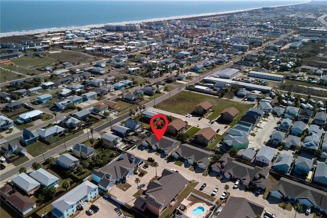 bird's eye view featuring a water view and a residential view