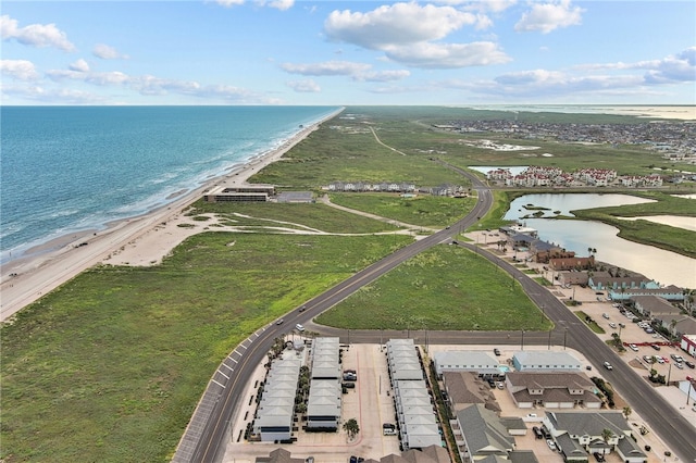 drone / aerial view with a view of the beach and a water view