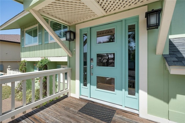 5 Bimini Dr, Rockport, TX 78382 - property entrance featuring board and batten siding