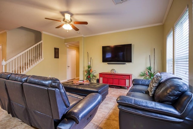 7009 Tocken Ct, Corpus Christi, TX 78414 - living area featuring ceiling fan, crown molding, tile patterned floors, and stairway