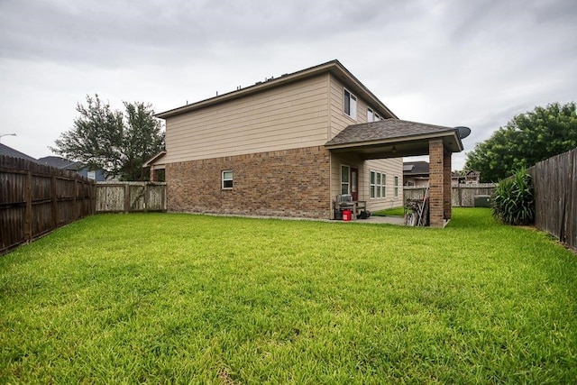 7009 Tocken Ct, Corpus Christi, TX 78414 - back of house with brick siding and a fenced backyard