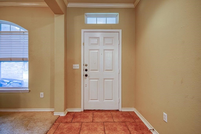 7009 Tocken Ct, Corpus Christi, TX 78414 - entryway with plenty of natural light, tile patterned floors, and crown molding