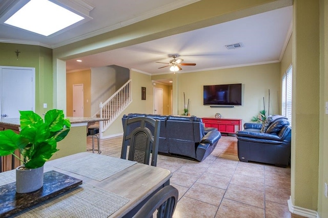 7009 Tocken Ct, Corpus Christi, TX 78414 - dining area with light tile patterned floors, stairs, crown molding, recessed lighting, and a ceiling fan