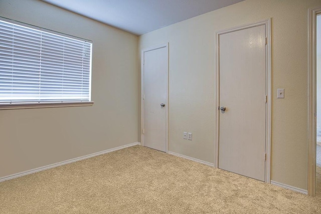 7009 Tocken Ct, Corpus Christi, TX 78414 - unfurnished bedroom with carpet flooring and baseboards
