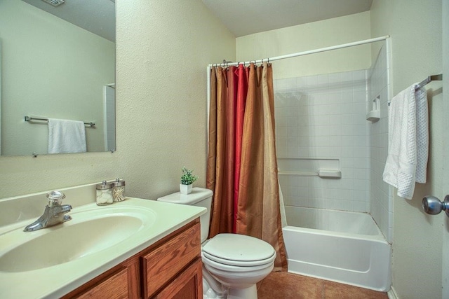 7009 Tocken Ct, Corpus Christi, TX 78414 - bathroom featuring vanity, shower / bath combo with shower curtain, and tile patterned floors