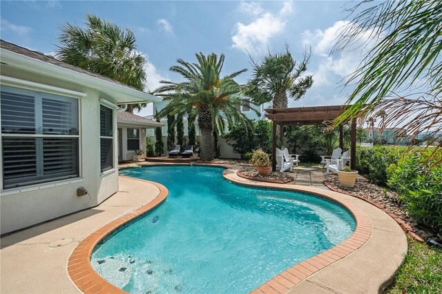 107 Angelfish, Aransas Pass, TX 78336 - outdoor pool with a patio and a pergola
