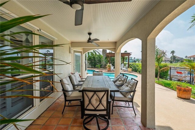 107 Angelfish, Aransas Pass, TX 78336 - view of patio with a ceiling fan and outdoor dining space