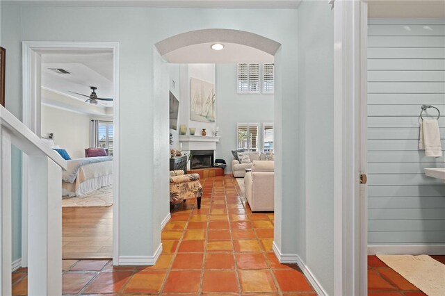 107 Angelfish, Aransas Pass, TX 78336 - corridor featuring arched walkways and light tile patterned floors